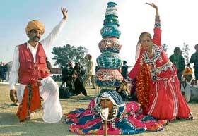 Artistes from Rajasthan perform during the Kila Raipur annual sports fetival on Saturday.