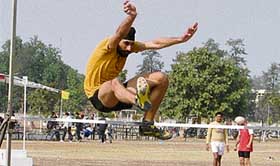 Mandeep Singh (best athlete) takes part in high jump event in the 42nd annual athletics meet of Punjab Agricultural University in Ludhiana on Friday. 
