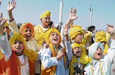 Students of a school dressed in yellow fly kites to celebrate Basant Panchami, which falls on February 11, in Amritsar on Saturday. 