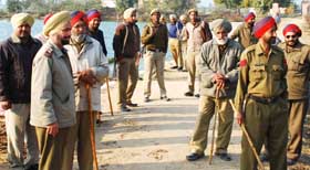 Cops standing outside the Gurudwara Mansarovar at village Bhai Rupa in Bathinda district on Saturday. 