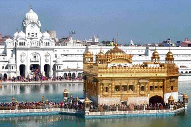 Devotees queue up at the Golden Temple on the eve of Basant Panchami on Sunday. 