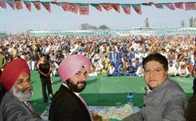 Punjab BJP president Rajinder Bhandari and MP Navjot Singh Sidhu at the party rally held at Ajnala on Sunday. 