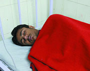 Rahul, a class 11th student of Kendriya Vidyalya in Delhi Cantt, recuperates inside the emergency ward of DDU Hosipital in the Capital on Monday.