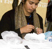 Manohari of Sri Lanka makes clay jewellery in the Sri Lanka section at the 22nd Surajkund Crafts Mela.