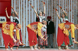 Students of KCW perform a Gujarati folk dance in Ludhiana on Tuesday.