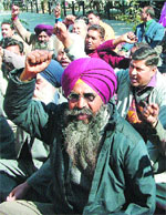 Members of the ministerial services, Punjab, stage a dharna outside the DC office in Jalandhar