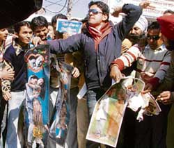 Activists of ABVP burn posters related to Valentine’s Day in Ludhiana .