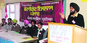 Gurmukh Singh Mann of the Punjab Students Union addresses a gathering in a meeting organised in Ludhiana.