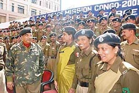 The BSF Director, General A.K. Mitra (left), interacts with members of a BSF contingent to be deployed with the United Nation's Peace Keeping Mission in Democratic Republic of Congo, in New Delhi on Wednesday.