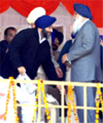 SAD president Sukhbir Badal seeking blessings from his father chief minister Parkash Singh Badal 