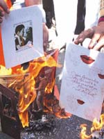 Hindutva activists shout slogans and burn greeting cards near Delhi University in the Capital