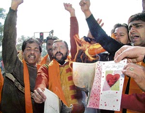 Shiv Sena (Punjab) activists burn Valentines Day cards in Amritsar on Thursday. 