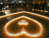 Candles are placed to form the shape of a heart at a promotional event for Valentine's Day at Yokohama Red Brick Warehouse in Yokohama, south of Tokyo