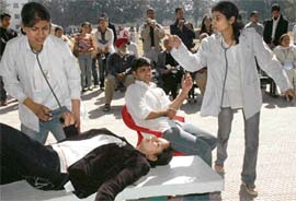 Students of the GGDSD College, Sector 32-C, perform street play Jeewan hai anmol in Chandigarh on Friday.
