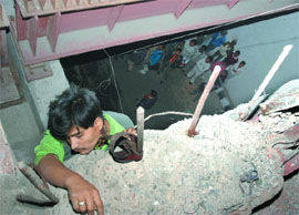 The body of Izahar Alam, who committed suicide on Tilak Bridge, ITO in the Capital on Friday. 