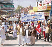 Activists of the CPM hold a protest against the hike in the prices of petrol and diesel in Fatehabad on Friday.