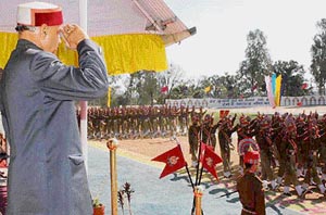 Chief Minister Prem Kumar Dhumal takes the salute at the passing-out parade of the Sashastra Seema Bal (SSB) at Sapri, near Jawalamukhi, in Kangra district on Friday. 