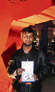 Director Siddharth Sinha shows the Silver Bear award which he won in the Berlinale Shorts section for his film Udedh Bun at the 58th Berlin International Film Festival in Berlin on Wednesday.