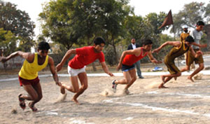 The participants thrust themselves forward in the 100 meter race held at the 55th annual sports meet of Government Rajindra College in Bathinda on Saturday.