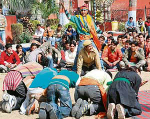 Members of the Seva Drama Company, Chandigarh, present a street play on environment pollution at Arya Postgraduate College in Panipat on Saturday.