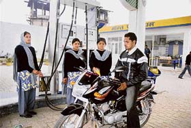 These girls take pride in working at the Ganga Filling Station near Jammu
