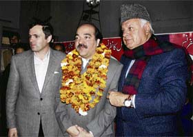 National Conference president Omar Abdullah along with his father and party patron Farooq Abdullah welcomes Ajatshatru Singh, son of Congress leader and MP Karan Singh, into the party fold in Jammu
