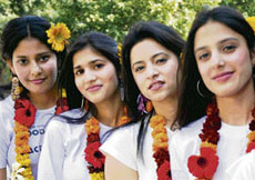 Students of Gandhi Nagar Women College pose for a photograph before their talent hunt competition in the campus in Jammu on Sunday.