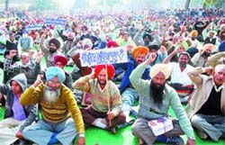 Protesting teachers shout slogans in support of their demands in Kapurthala on Sunday