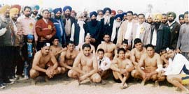 Members of a kabaddi team with MP Sharanjit Singh Dhillon, on the concluding day of the annual sports festival at village Gaunsgarh on Sunday.