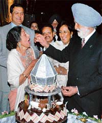 Marshal of the Indian Air Force Arjan Singh and his wife Teji celebrate their 60th wedding anniversary in New Delhi