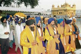 Panj Piaras, leading the Bhagat Ravidas Khalsa Jagriti march organised by the Shiromani Akali Dal Amritsar (Presidium), enter the Golden Temple complex in Amritsar on Sunday.