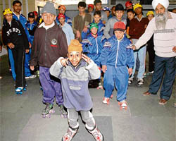 Special children during a sports camp at Shivalik Public School in Mohali on Monday.