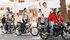 A group of boys without helmets participate in a roadshow organised by the chemical engineering department of the PU in Sector 10, Chandigarh, on Monday.
