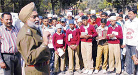 Chandigarh police DSP J.S. Cheema gives road safety tips to rural students from Hoshiarpur at Traffic Park, Sector 23, Chandigarh on Monday.