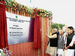 Haryana Chief Minister Bhupinder Singh Hooda lays the foundation stone of an industrial model township on the outskirts of Rohtak on Monday. 