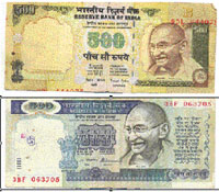 A misprinted currency note (above) and an old currency note (below) refused by employees of two different banks in Jalandhar