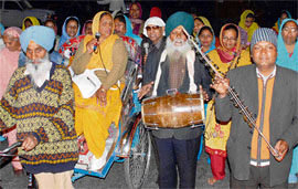Religious Fervour: Devotees take out nagar kirtan on the eve of Guru Ravi Dass jayanti,