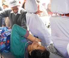 A patient being taken from Zonal Hospital, Mandi, to IGMC, Shimla, in a private Maruti van as there was no ambulance available.