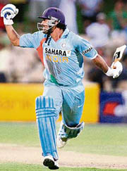 M. S. Dhoni celebrates after hitting the winning runs during the crucial one-dayer between India and Sri Lanka in Adelaide on Tuesday.