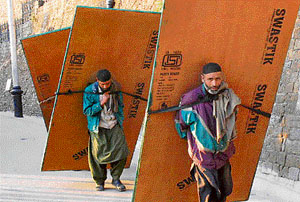 Porters continue to be the most trusted supply lines of essentials in hilly regions. 