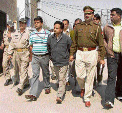 K.K. Aggarwal, an accused in the kidney racket and accomplice of Dr Amit, being produced in a court in Ambala on Wednesday.
