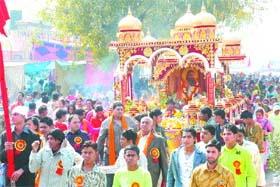 Devotees take out a shobha yatra on the eve of Guru Ravidass Jayanti in Jalandhar