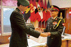Lt-General Vinay Sharma takes over the command of the Rising Star Corps of the Army from Lt-General B.S. Nagal at Yol Cantonment in Dharamsala on Thursday. 