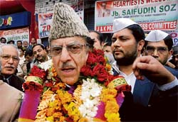 Saif-ud-din Soz being welcomed during a public rally.