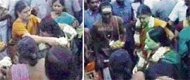 In this TV footage J. Jayalalithaa and her confidante Sasikala Natarajan exchange garlands at a temple in Nagapattinam district
