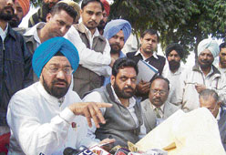 Lok Bhalai Party chief Balwant Singh Ramoowalia addresses a press conference at Sangrur