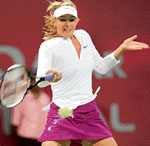 Russias Maria Sharapova in action against compatriot Gallina Voskoboeva in the second round of the Qatar Open in Doha.