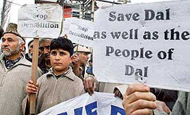 Members of the Dal Protection Force protest against the demolition drive by the Lakes and Development Authority in Srinagar on Friday.