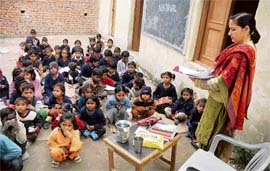 Children of Bihari labourers get free education in Najwal village on the outskirts of Jammu.
