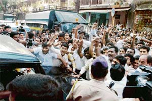 Angry supporters of the MNS protest the arrest of their leaders